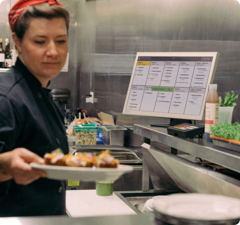 Clover Kitchen Display System mounted in a commercial kitchen