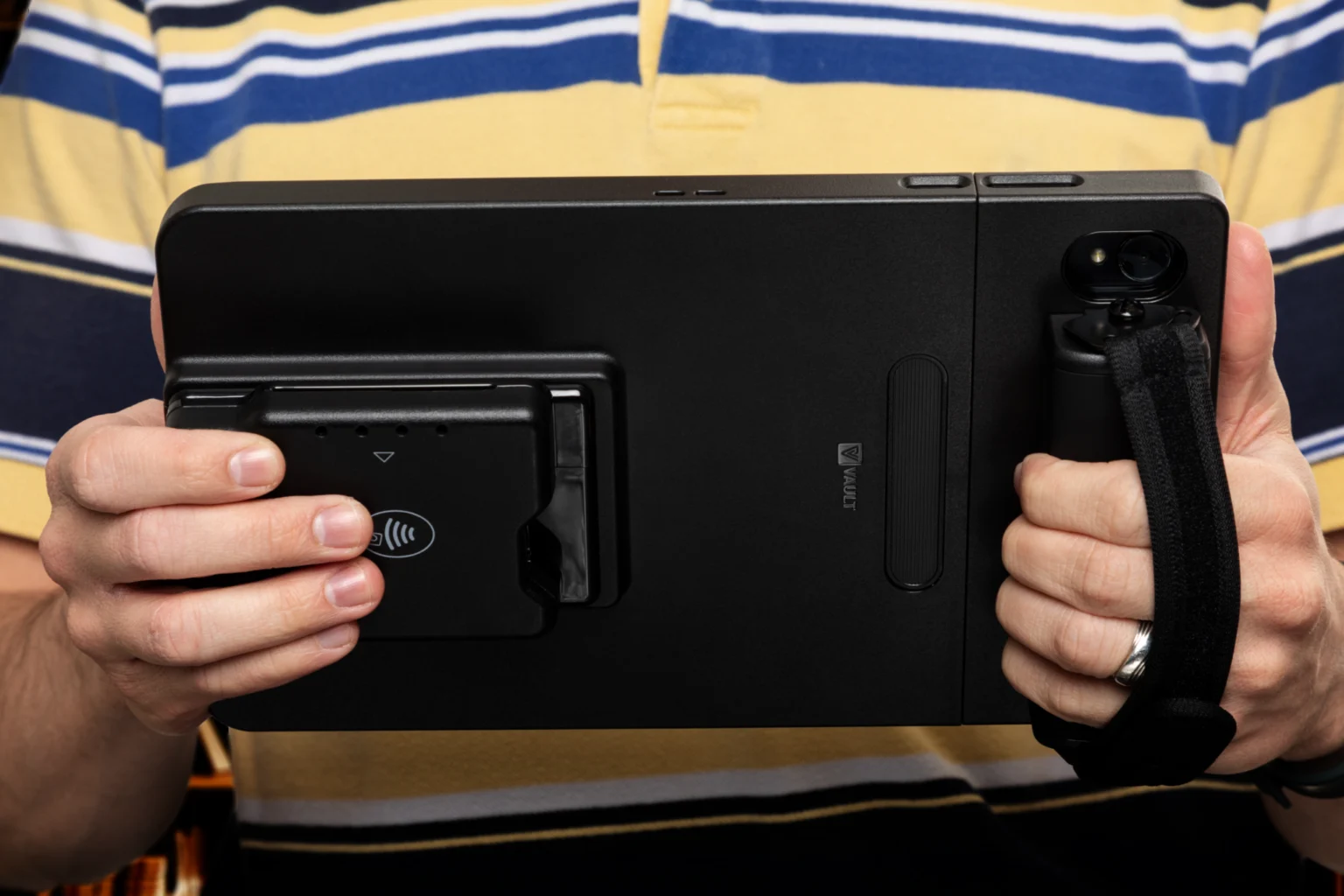 Figure Handheld tableside ordering and pay-at-the-table device